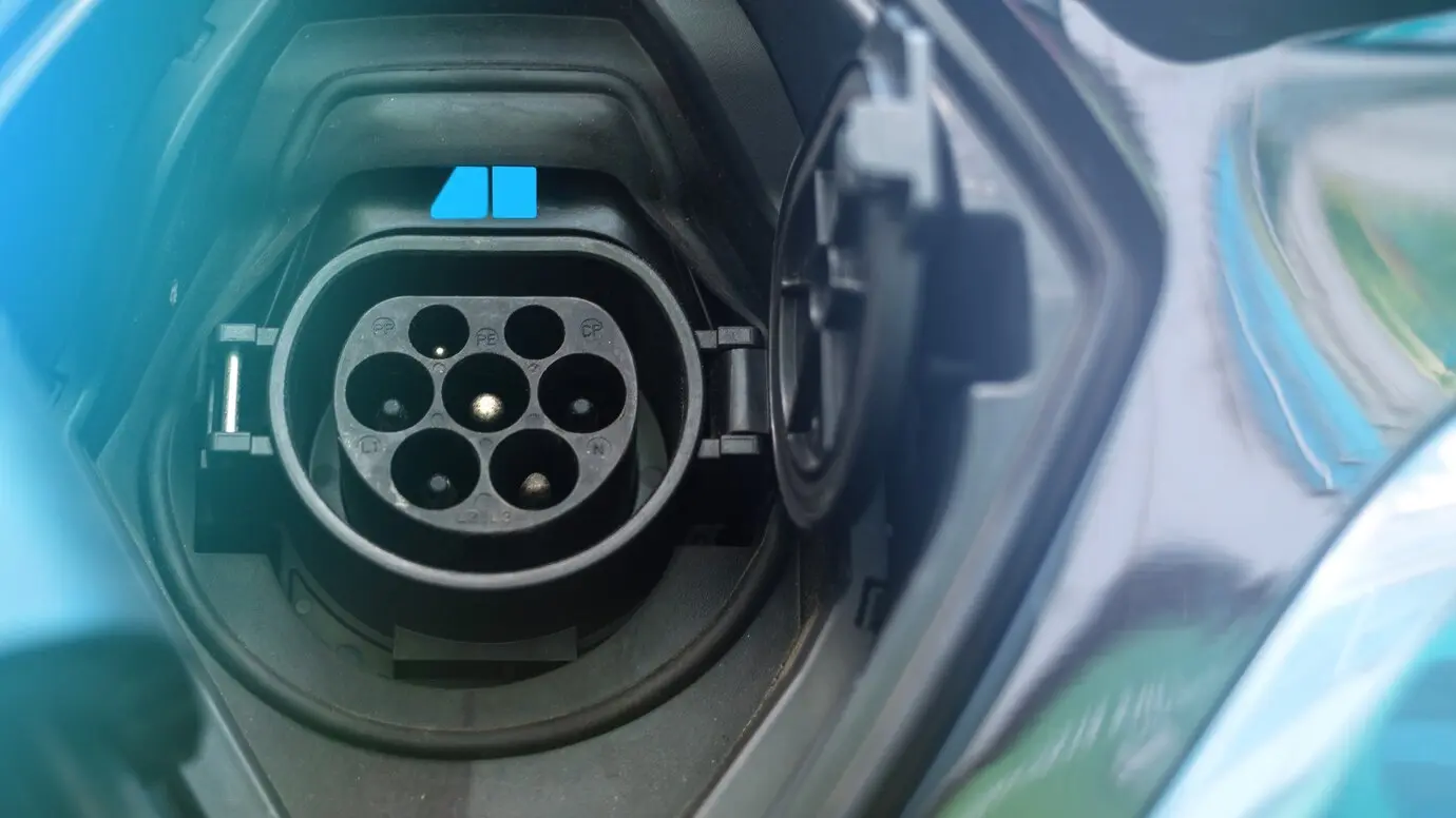 charging-socket-electric-car-with-blue-light_1268-17706.jpg